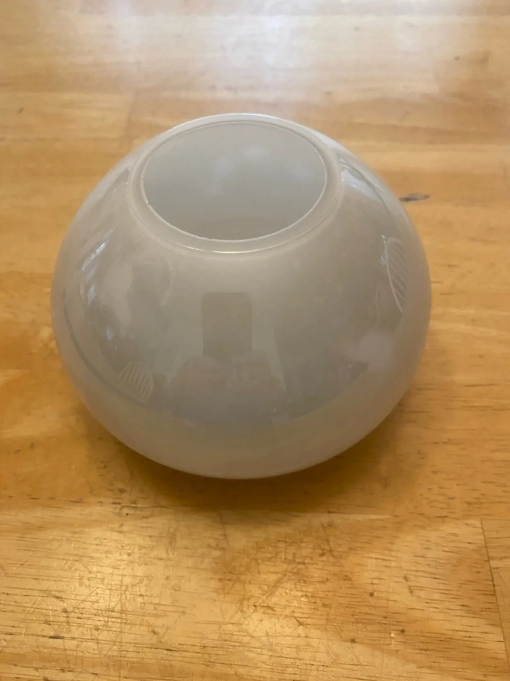 Crate & Barrel Pearlized light green glass globe vase about 5x3